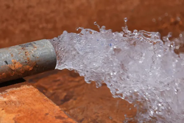 Water discharging from a borehole installation in Somalia